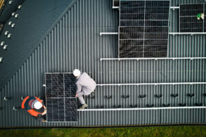 Solar panels being installed by workers