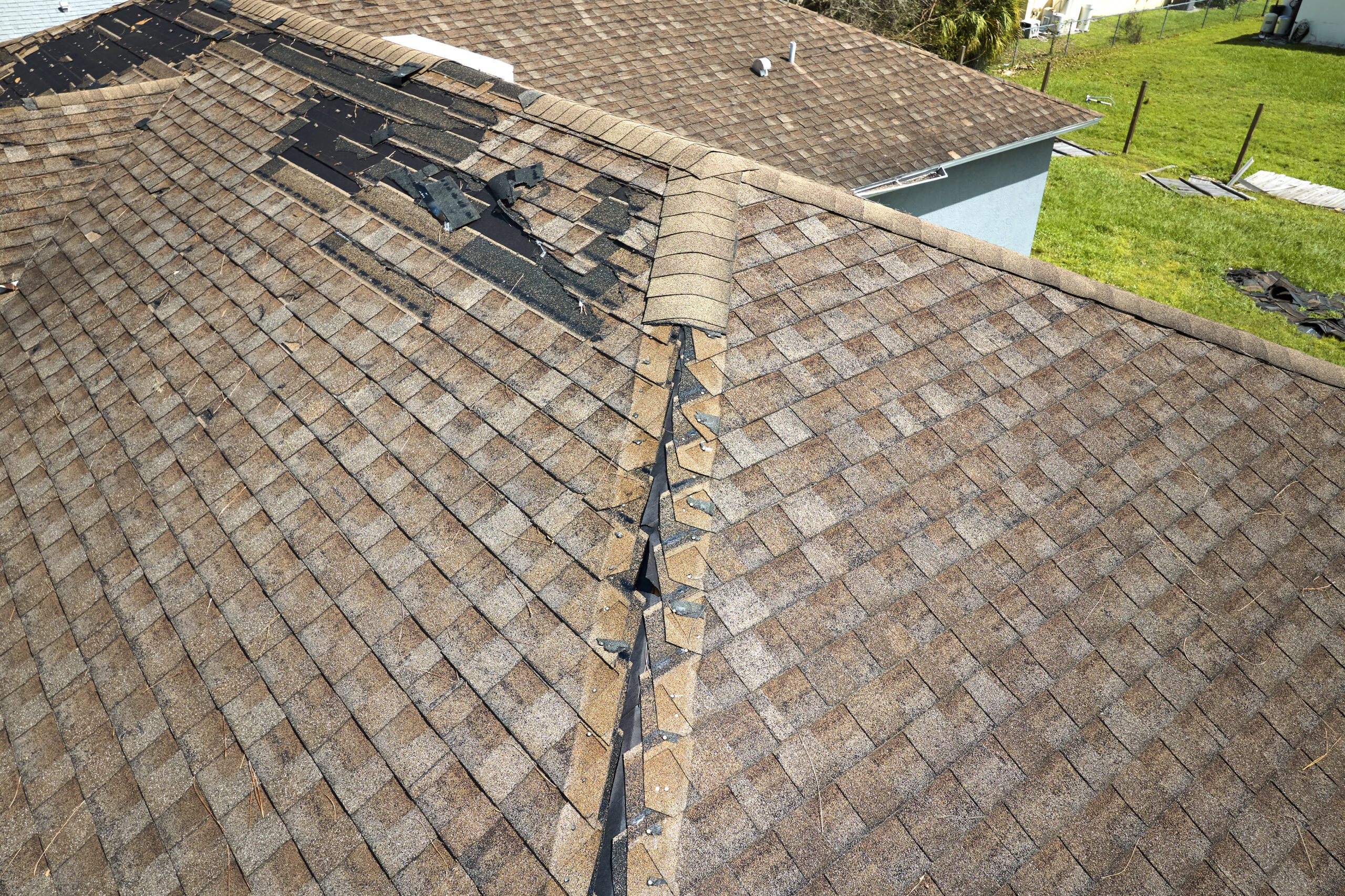 an above angle of a damaged roof