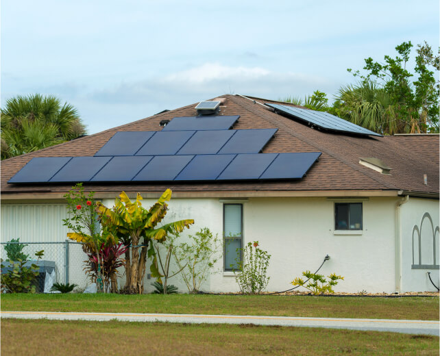 white house with solar panels